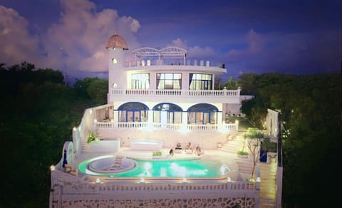 Property building, Night, Seating area, Pool view, Sea view, Sea view, Swimming pool, sunbed