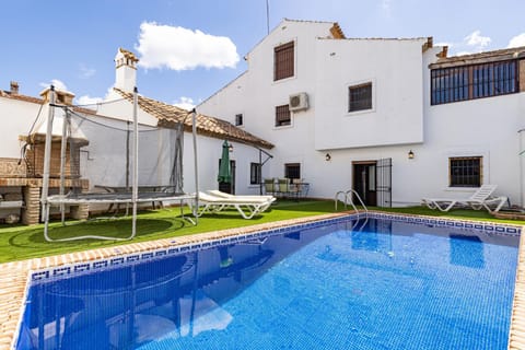 Property building, Living room, Swimming pool