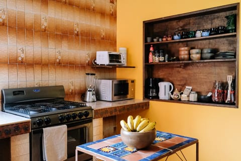 Kitchen or kitchenette, microwave, oven, stove, toaster