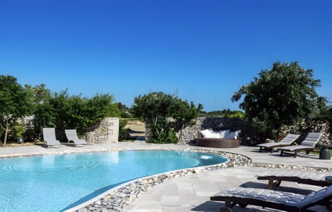 Property building, Living room, Swimming pool