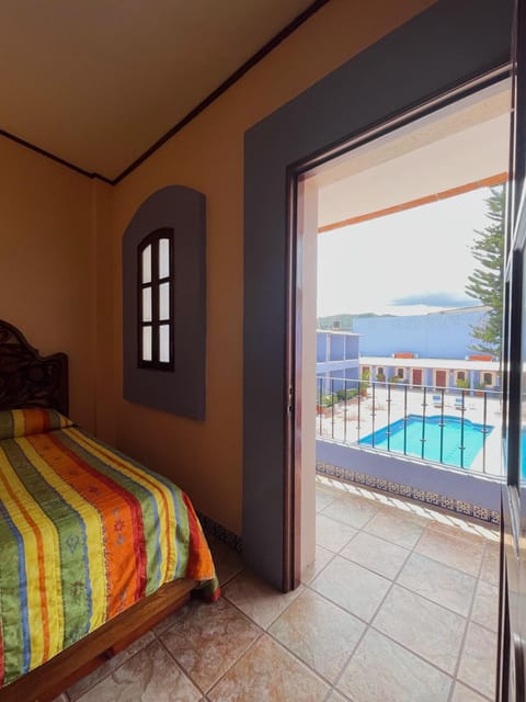 Bed, View (from property/room), Balcony/Terrace, Photo of the whole room, Pool view, Swimming pool