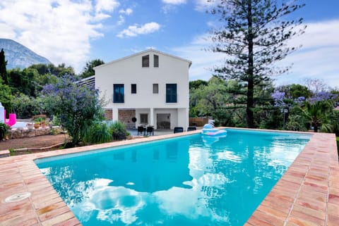 Property building, Living room, Swimming pool
