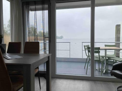 Natural landscape, View (from property/room), Balcony/Terrace, Balcony/Terrace, Living room, Seating area, Dining area, Lake view, hair dresser