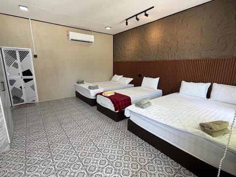 Bed, towels, air conditioner