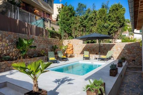Property building, Living room, Swimming pool