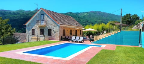 Property building, Off site, Day, Natural landscape, Mountain view, Pool view, Swimming pool, sunbed