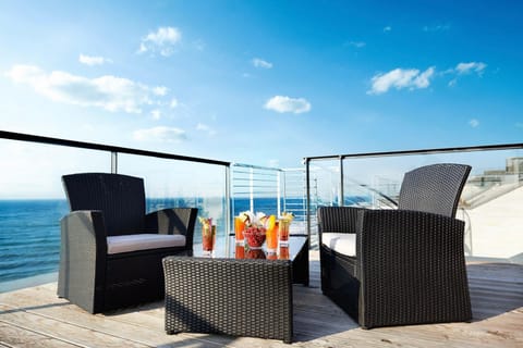 View (from property/room), Balcony/Terrace, Seating area, Sea view