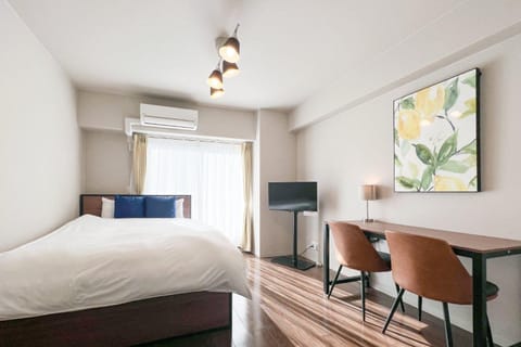 Bed, TV and multimedia, Seating area, Bedroom, air conditioner