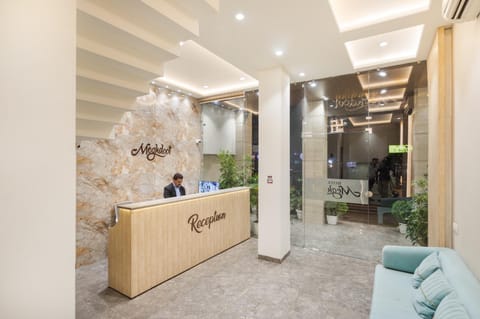 People, Living room, Lobby or reception, Seating area