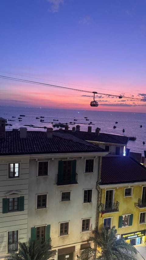 Property building, Natural landscape, City view, Sea view, Sunset
