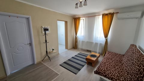 Photo of the whole room, air conditioner