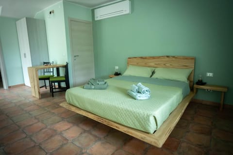 Bed, Photo of the whole room, Bedroom, towels, air conditioner