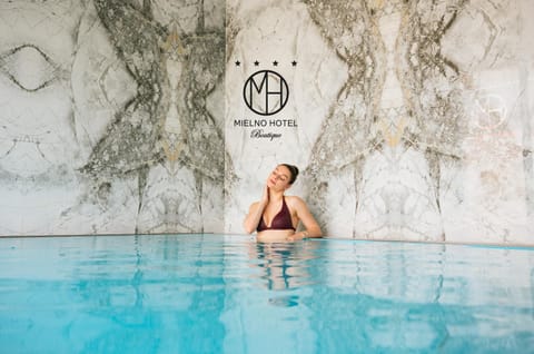 People, Property logo or sign, Guests, Pool view, Swimming pool