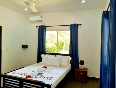 Bed, Bedroom, fireplace, towels, air conditioner