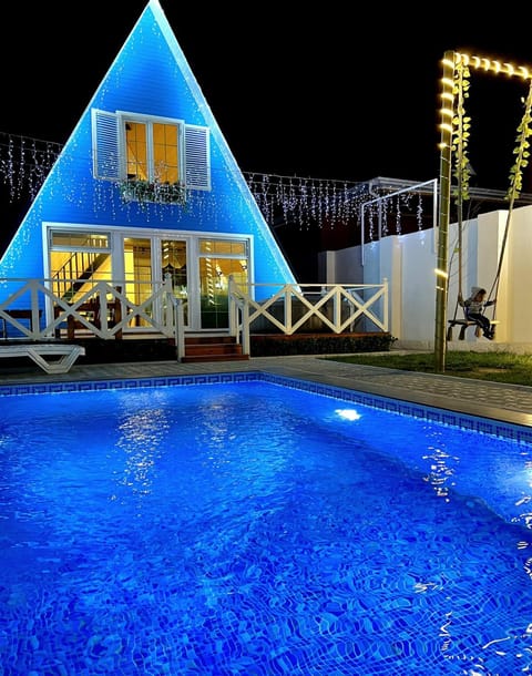 Property building, Night, Pool view, Swimming pool, sunbed