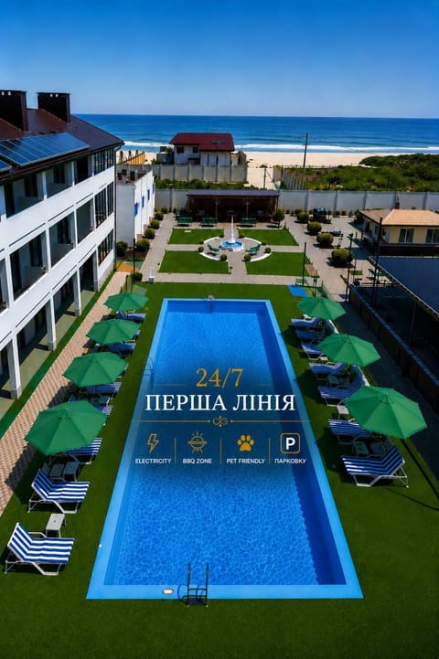 Property building, Day, Natural landscape, Beach, Pool view, Sea view, Swimming pool, Location, Parking, sunbed