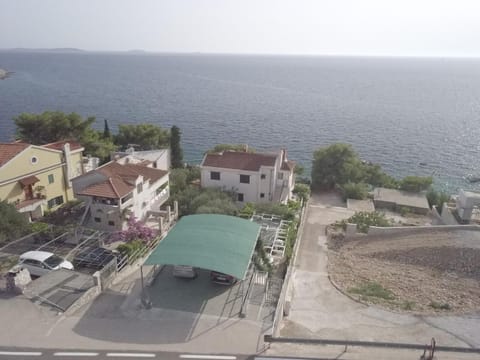 Property building, Natural landscape, Bird's eye view, Sea view, Street view, Parking