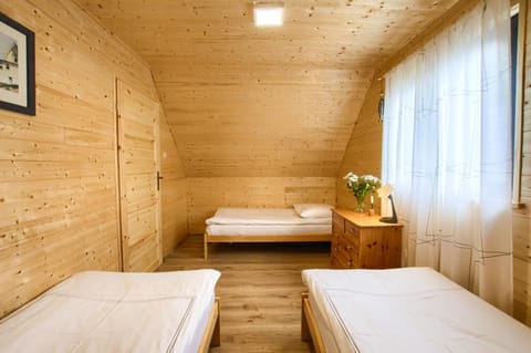 Kolorowe Domki Rewal, 200m do plaży, morza Uwielbiany przez rodziny z dziećmi House in West Pomeranian Voivodeship, Poland