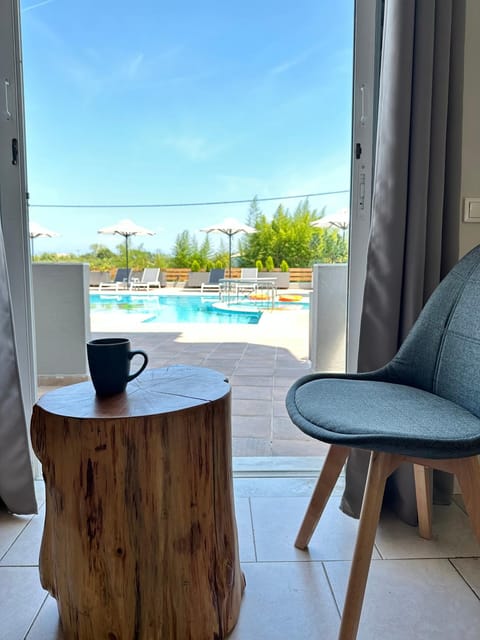 Patio, Day, Natural landscape, View (from property/room), Balcony/Terrace, Living room, Seating area, Pool view, Swimming pool, sunbed