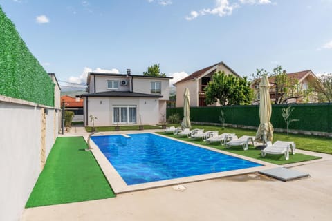 Property building, Pool view, Swimming pool, sunbed