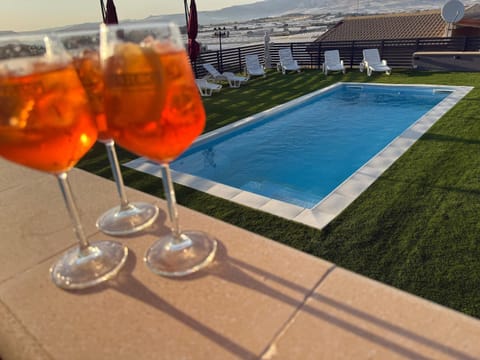 Property building, Living room, Swimming pool