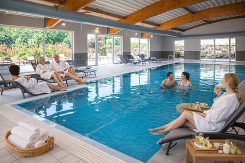 People, Natural landscape, Pool view, Swimming pool, sunbed