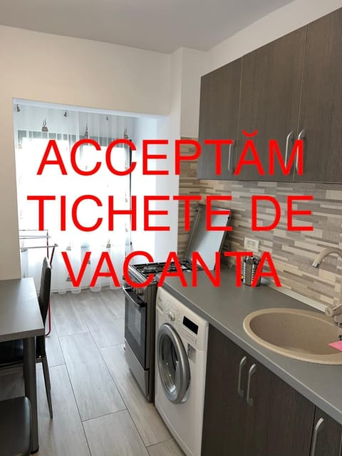 Kitchen or kitchenette, washing machine