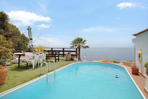 Property building, Living room, Swimming pool