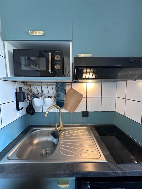 Kitchen or kitchenette, stove, kitchen