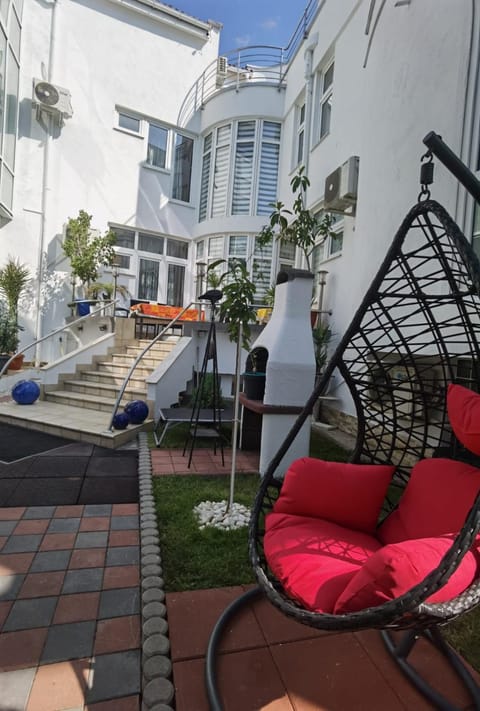 Property building, Patio, Day, Garden, View (from property/room), Balcony/Terrace, Seating area, Garden view, sunbed
