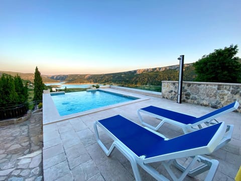 Patio, Day, Natural landscape, Mountain view, Pool view, Swimming pool, sunbed