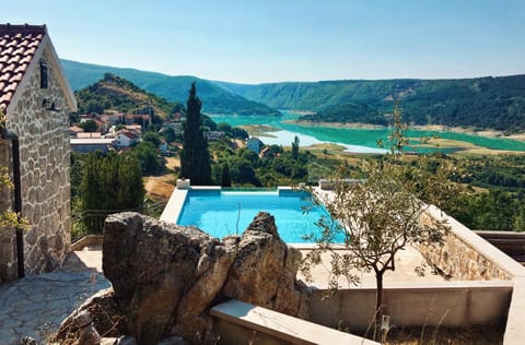 Property building, Nearby landmark, Day, Natural landscape, View (from property/room), Lake view, Lake view, Mountain view, Pool view, Pool view, River view, Swimming pool