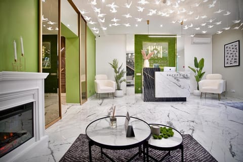 Staff, Living room, Seating area, fireplace