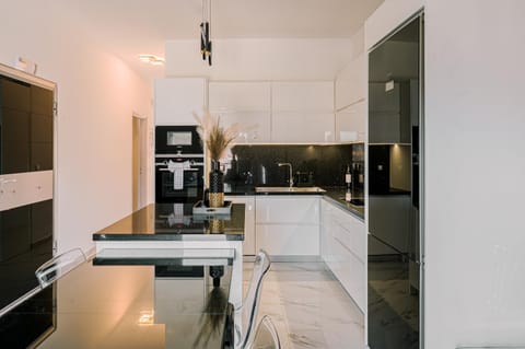 Dining area, dishwasher, oven, stove, toaster