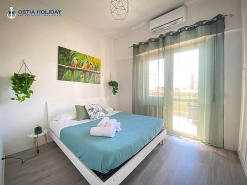 Photo of the whole room, Bedroom, towels, air conditioner