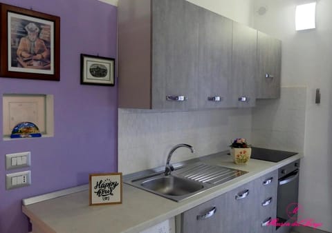 Kitchen or kitchenette, oven, stove, washing machine