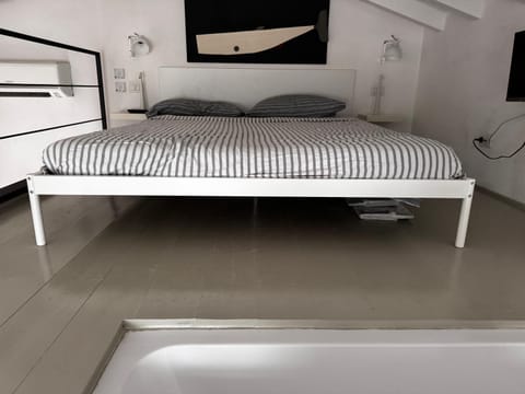 Loft due livelli di design pubblicato su riviste architettura con due posti auto Apartment in Porto Santo Stefano