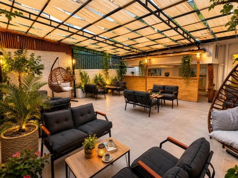 Property building, Garden, Garden, Living room, Seating area, Garden view, Garden view