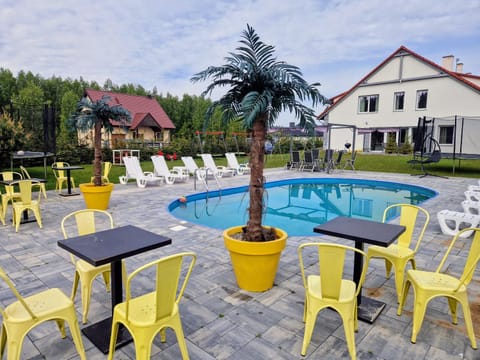 Property building, Pool view, Swimming pool, sunbed