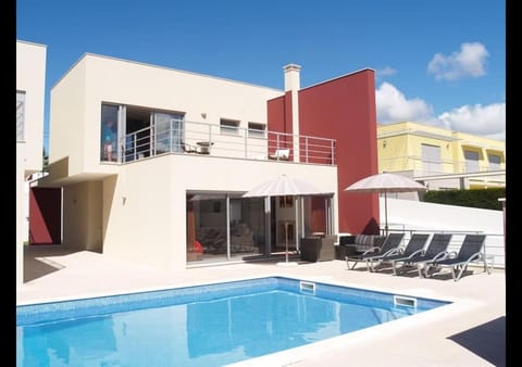 Property building, Swimming pool, sunbed