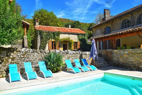 Property building, Patio, Natural landscape, Pool view, Swimming pool, sunbed
