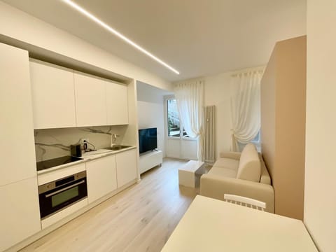 Kitchen or kitchenette, Living room, Seating area, stove