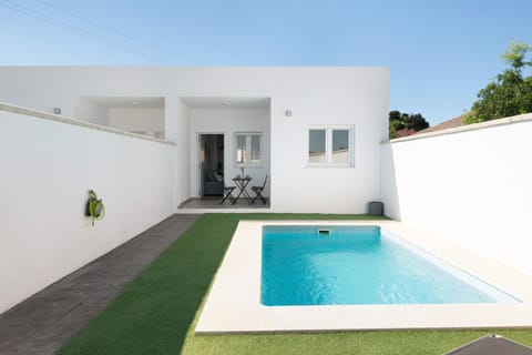 Property building, Living room, Swimming pool