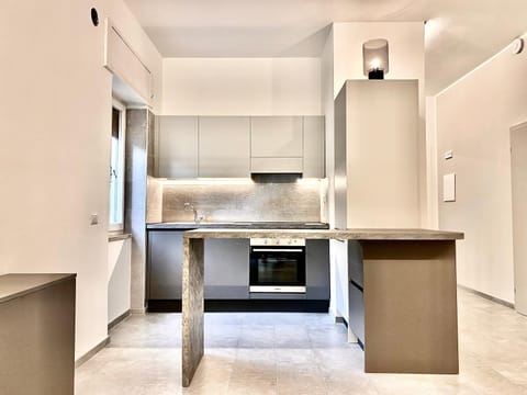 Kitchen or kitchenette, oven, stove