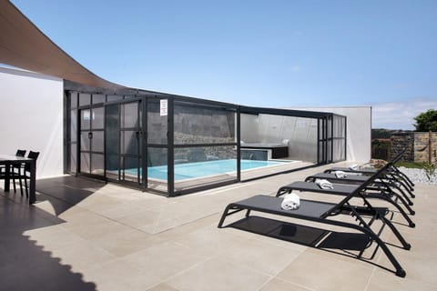 Property building, Living room, Swimming pool