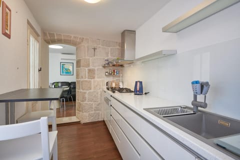 Kitchen or kitchenette, stove