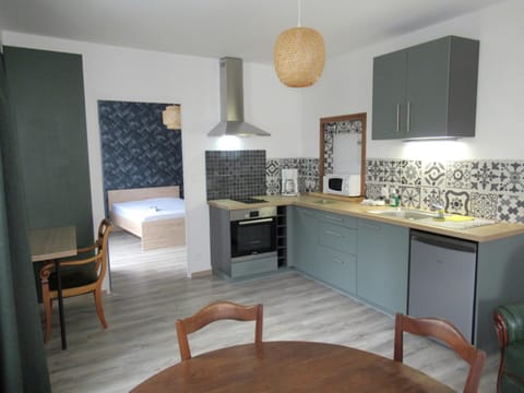 Kitchen or kitchenette, oven, stove