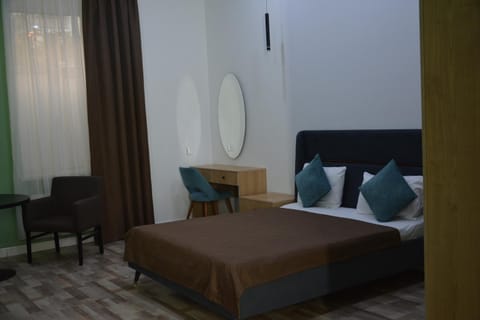 Bed, Photo of the whole room, Seating area, Bedroom