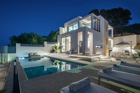 Property building, Patio, Night, Pool view, Swimming pool, sunbed