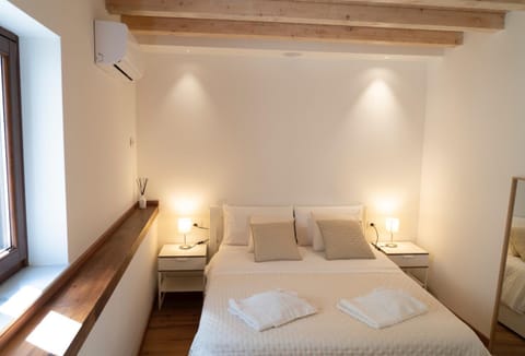 Bed, Photo of the whole room, Bedroom, towels, air conditioner